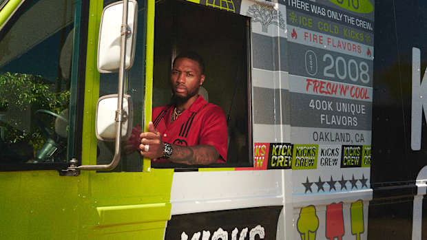 Damian Lillard drives a bus.